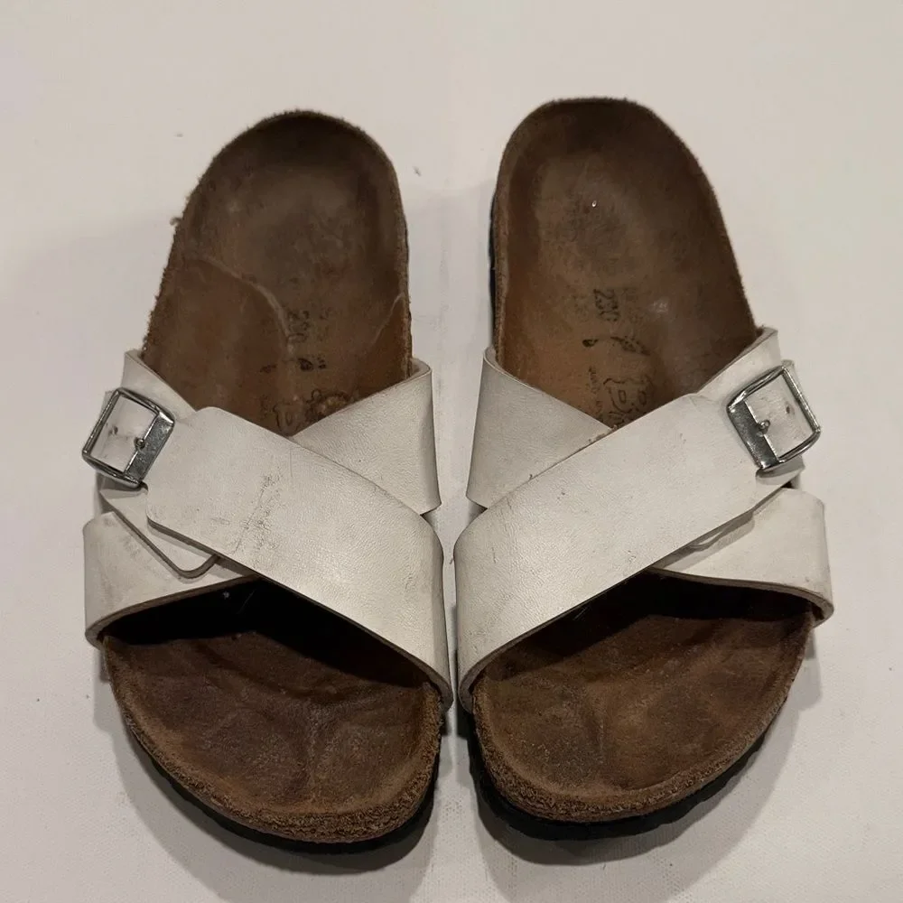 Birkenstock White Cross-Strap Sandals with Silver Buckles